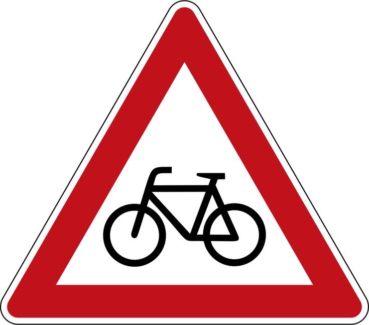 Sinalização de advertência indicando a presença de bicicletas na via